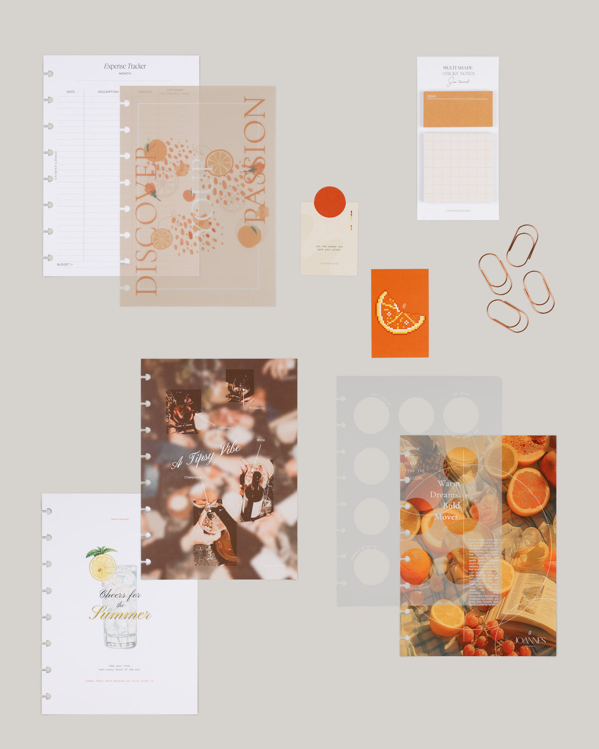 Edition 004 citrus stationery, dashboards and accessories laid out on a warm grey background